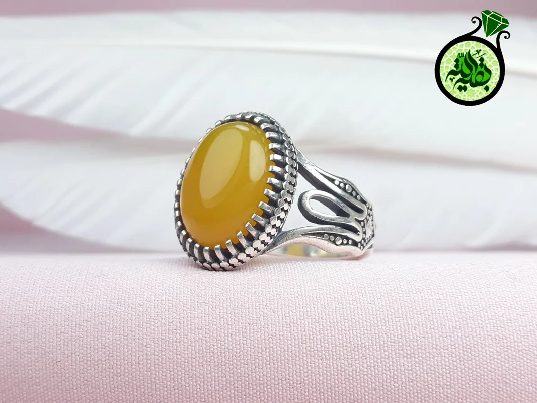 انگشترنقره عقیق زرد شرف الشمس اصل(مزین به دعای شرف الشمس)رکاب طرح لاله