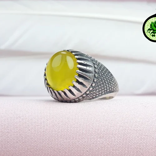 انگشترنقره عقیق زرد شرف الشمس اصل(مزین به دعای شرف الشمس)طرح حصیری