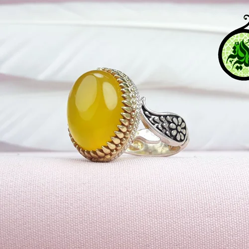 انگشترنقره عقیق زرد شرف الشمس اصل(مزین به دعای شرف الشمس)بغل طرح گل