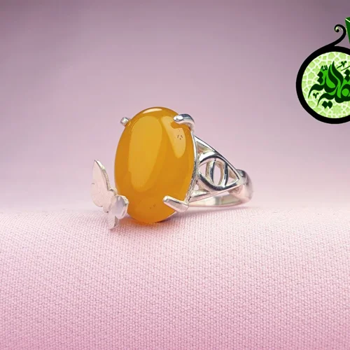 انگشترنقره عقیق زرد شرف الشمس اصل زنانه (دعای شرف الشمس) طرح پروانه ای بازو طرح چشم