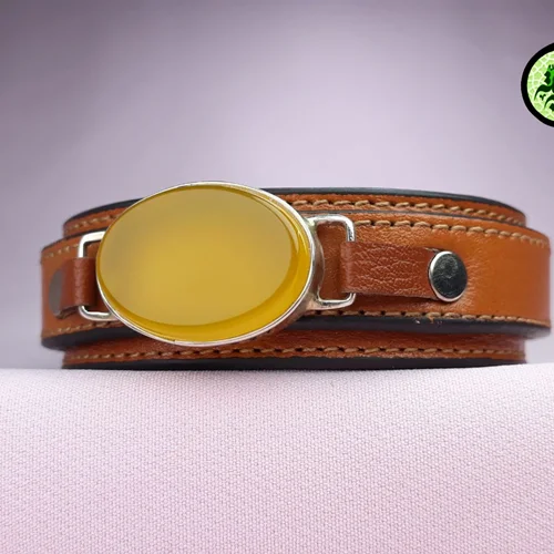 دستبندچرمی عقیق زردشرف الشمس اصل خطی پشت بسته همراه حرز امام جواد(ع)