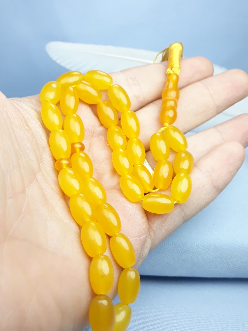 تسبیح عقیق زرد شرف الشمس اصل ۳۳ دانه